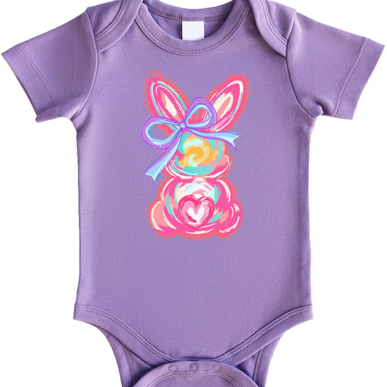 Baby girl wearing a purple watercolor Easter bunny bodysuit with pastel bow detail