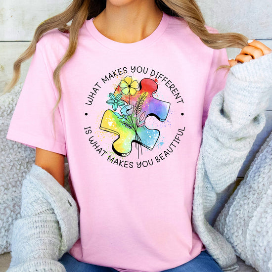 Detail shot of What Makes You Different text with colorful puzzle piece graphics