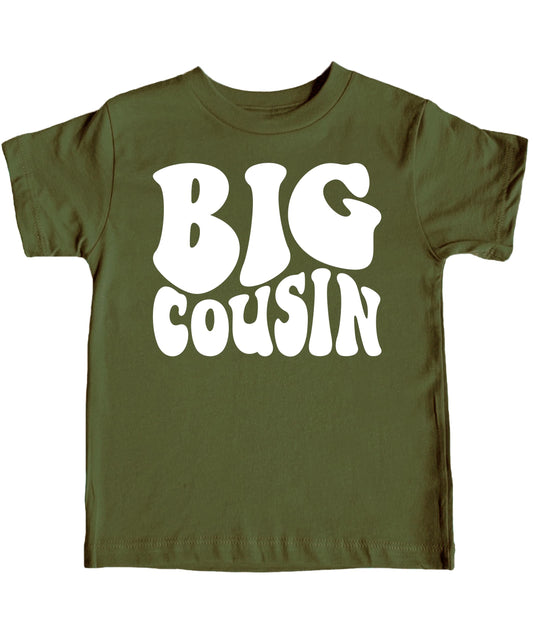 Military green toddler tee with white retro Big Cousin graphic print, front view