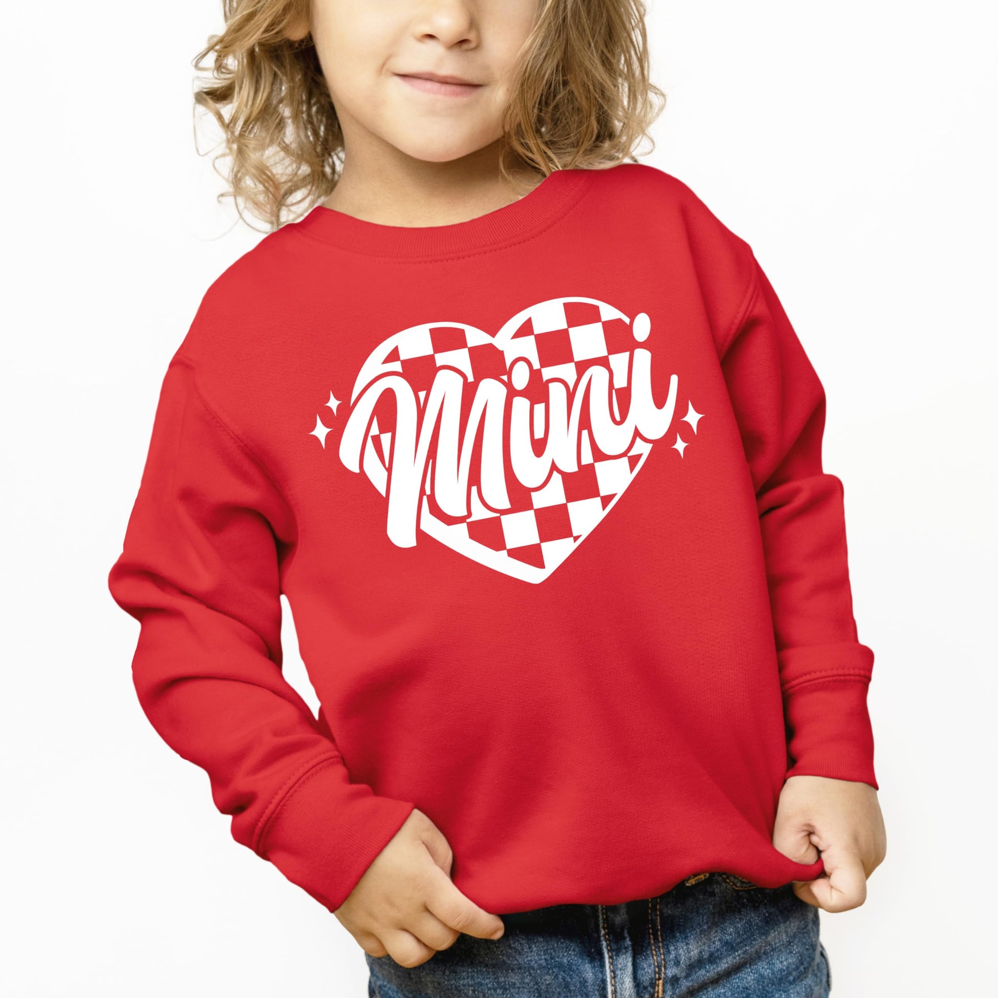 Mom and child wearing matching red Valentine's Day checkered heart sweatshirts