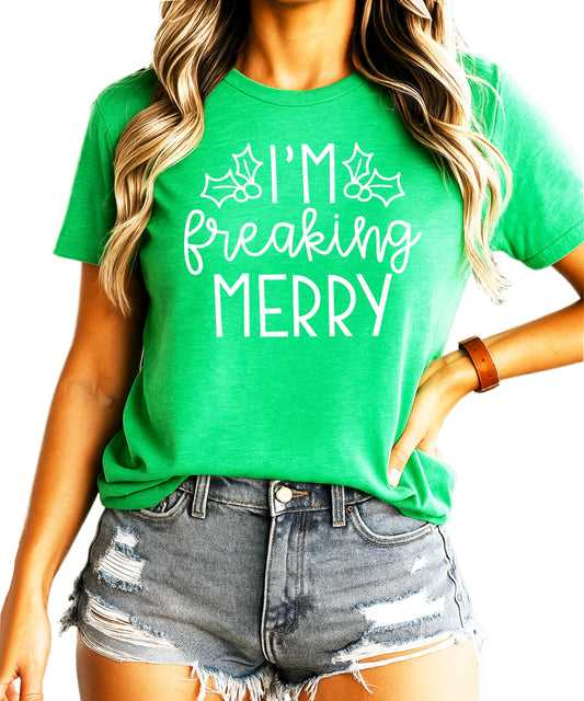 Front view of funny I'm Freaking Merry women's Christmas graphic tee in vintage green