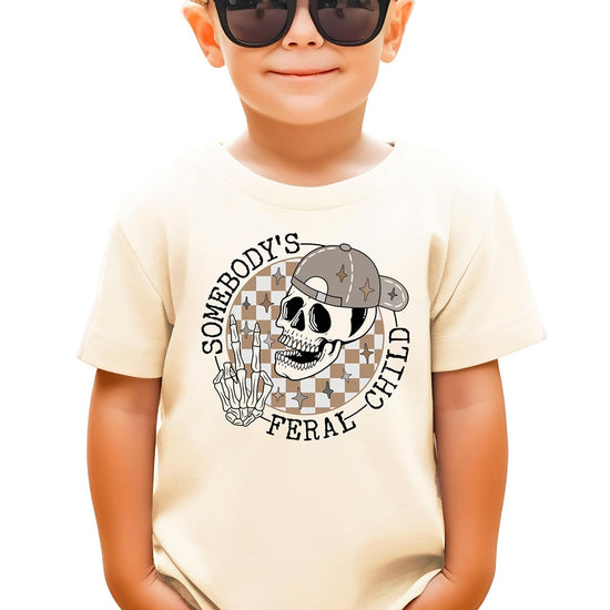 Front view of Somebody's Feral Child skeleton graphic tee for toddlers and kids in natural color