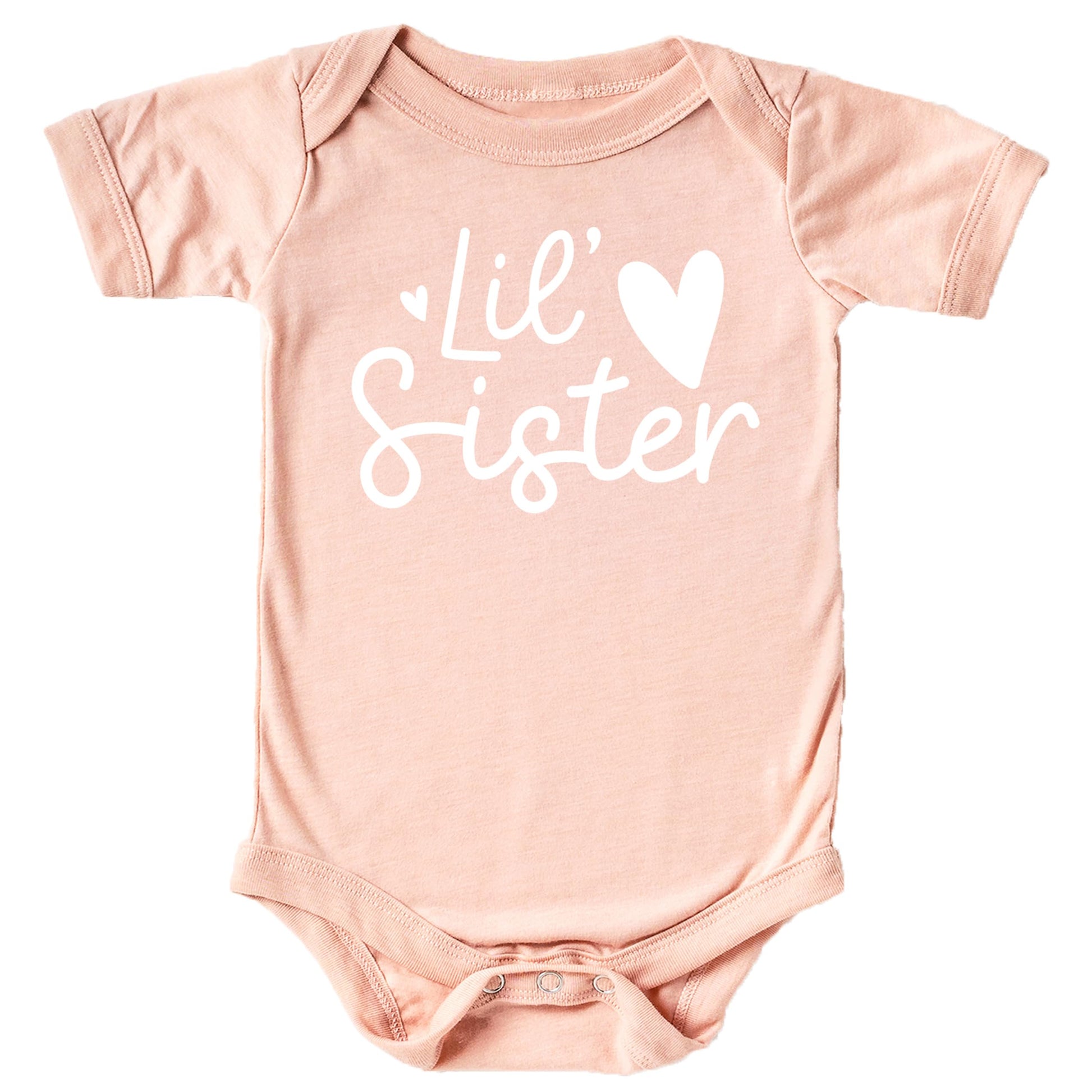 Mauve baby bodysuit with white Lil Sister heart graphic by Olive Loves Apple