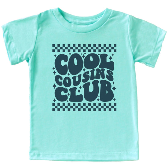 Cool Cousins Club checkered graphic tee in peach color displayed flat