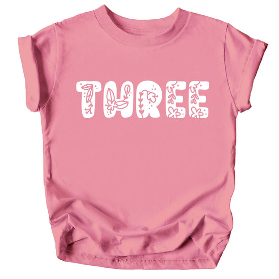 Multiple color options of girls floral number birthday shirts displayed together