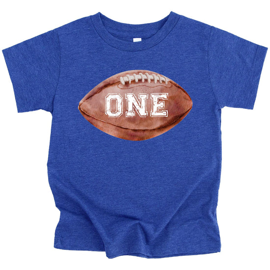 Close-up of distressed football birthday graphic on natural baby tee