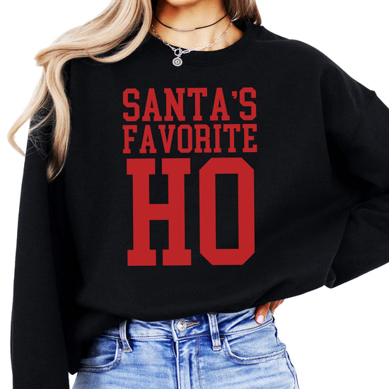 Side angle view of Santa's Favorite Ho Christmas sweatshirt on model