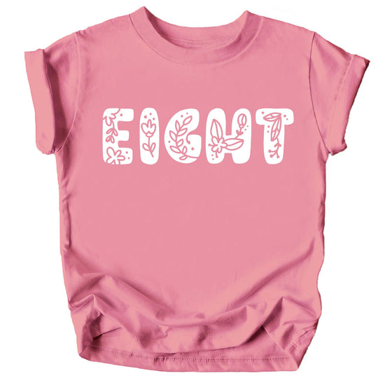 Close-up of floral Eight graphic print on girls birthday party shirt in pink