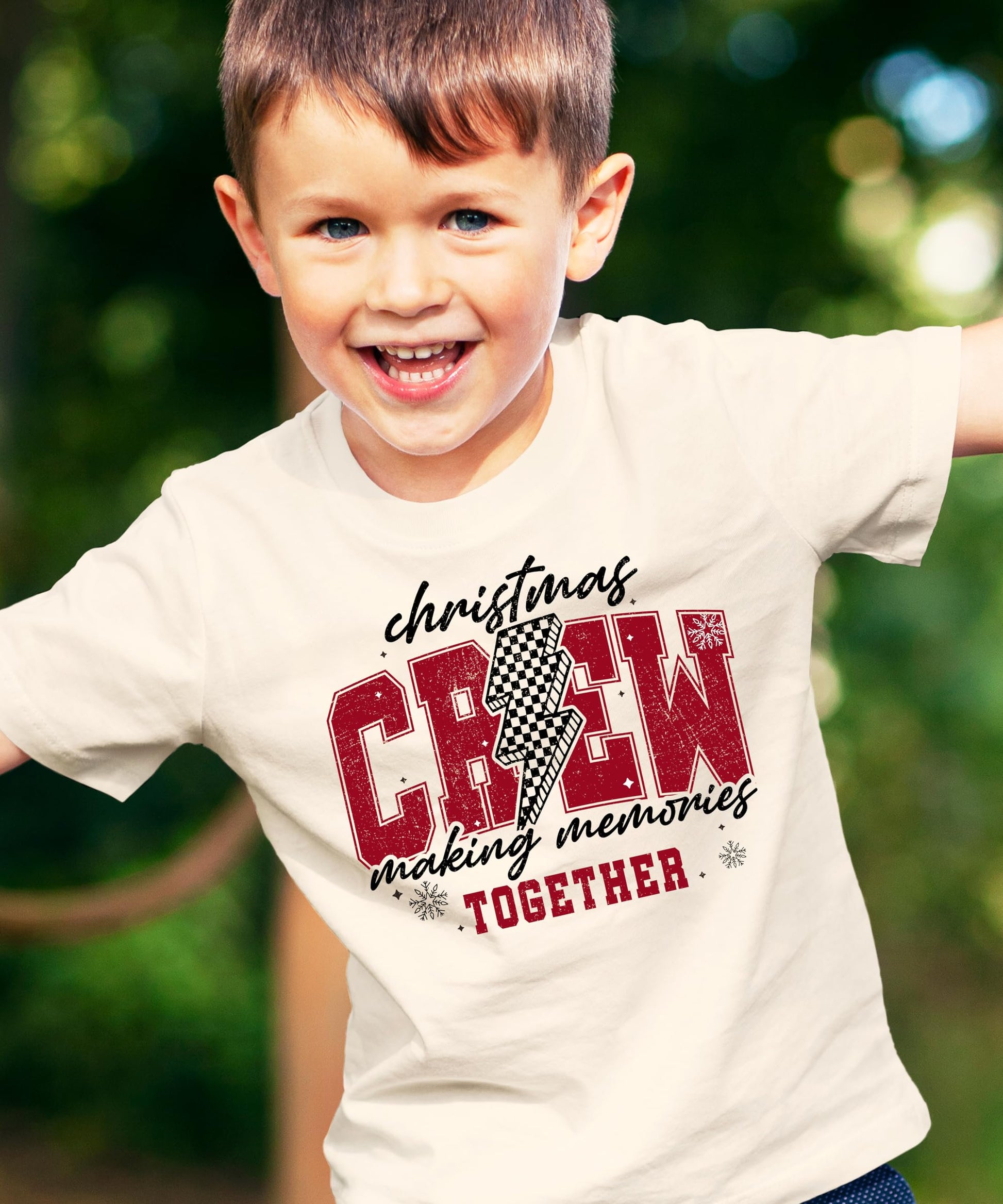 Christmas Crew 2024 matching family holiday tee with bold checkered lightning graphic design on natural fabric