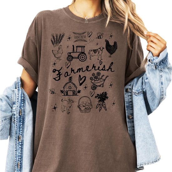 Farmerish graphic tee laid flat showing full farm-themed illustration with country style design