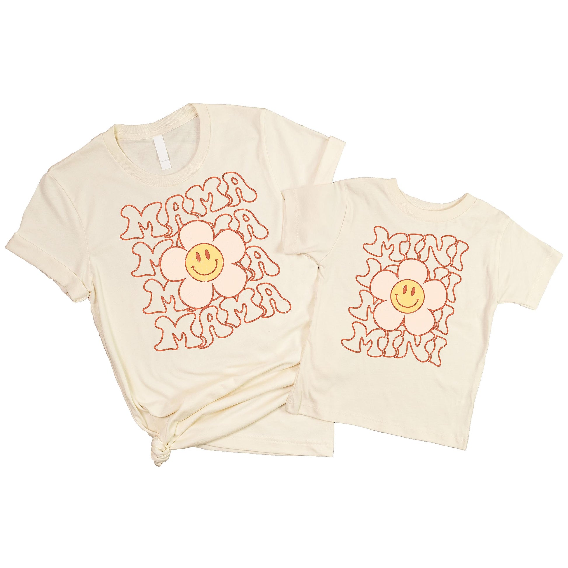 Close-up of Happy Daisy graphic print on natural matching mama and mini shirt