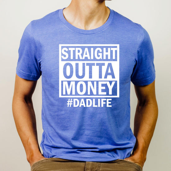 Flat lay of royal blue Straight Outta Money men's graphic tee