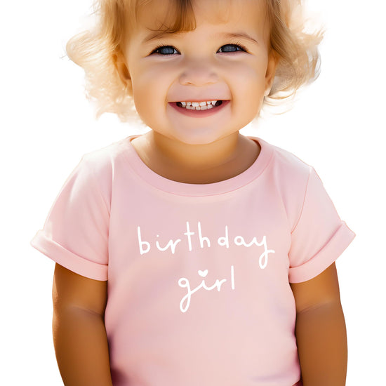 Olive Loves Apple Birthday Girl heart tee displayed on white background, youth sizing