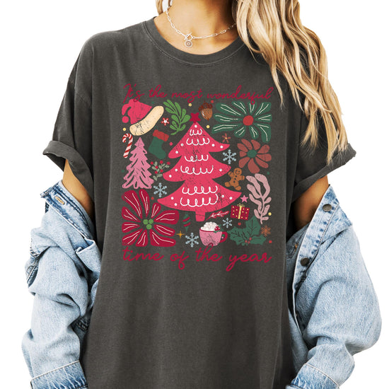 Ivory women's Christmas graphic tee with holiday collage and 'It's the Most Wonderful Time of the Year' text