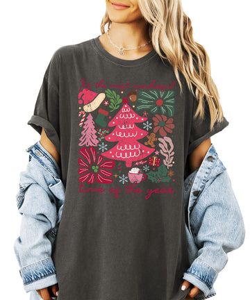 Ivory women's Christmas graphic tee with holiday collage and 'It's the Most Wonderful Time of the Year' text