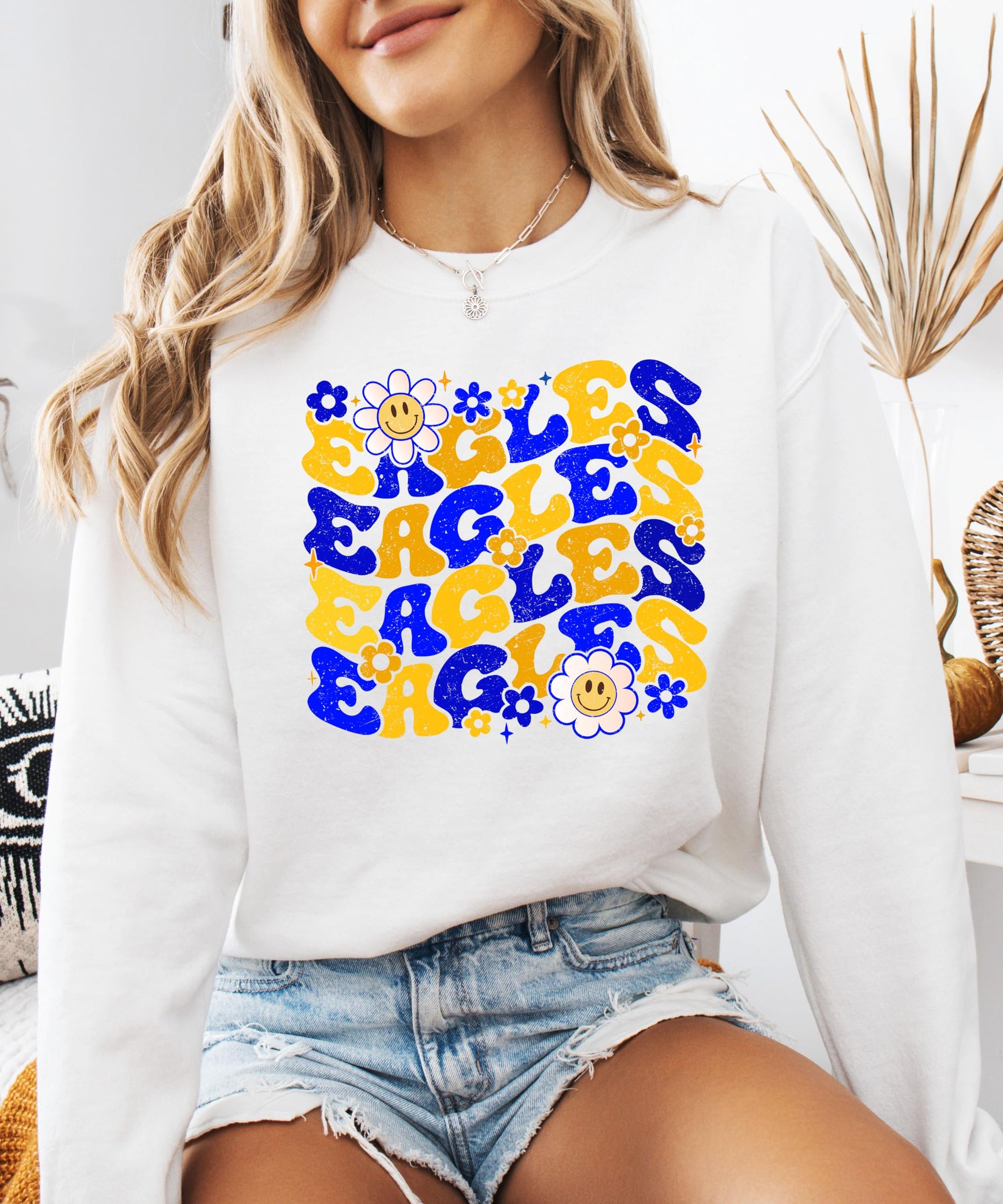 Flat lay of gray Eagles retro sweatshirt showing full graphic design