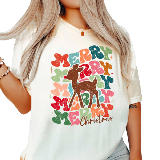 Front view of retro-style Christmas shirt for women featuring a playful red-nosed reindeer graphic