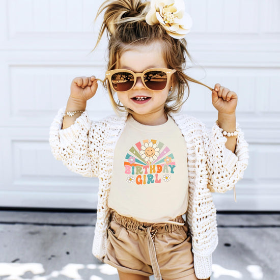 Detail shot of professional print quality on retro rainbow birthday girl shirt