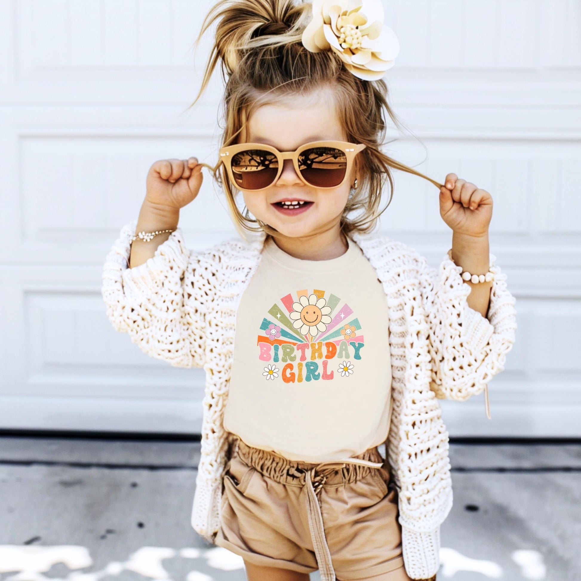 Detail shot of professional print quality on retro rainbow birthday girl shirt