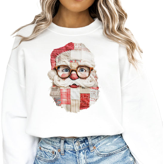 Women's black Santa sweatshirt laid flat showing full faux patchwork Christmas graphic design detail