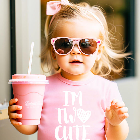 Toddler second birthday outfit featuring I'm Two Cute graphic tee in mauve