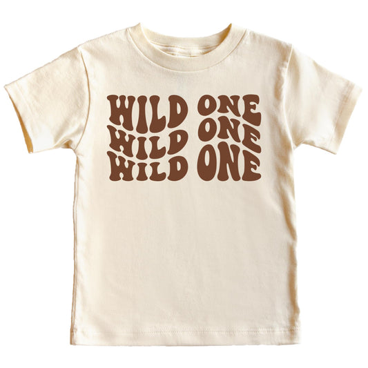 Baby wearing Wild One first birthday shirt showing fit and style on child