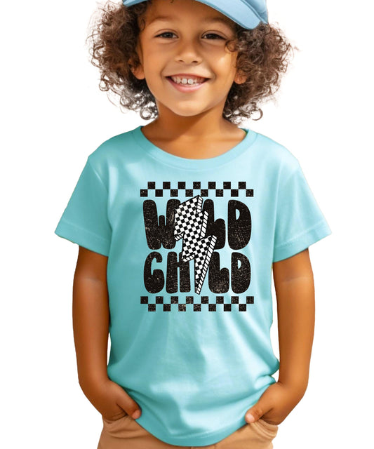 Close-up of Wild Child retro lettering and checkerboard pattern graphic on boys t-shirt