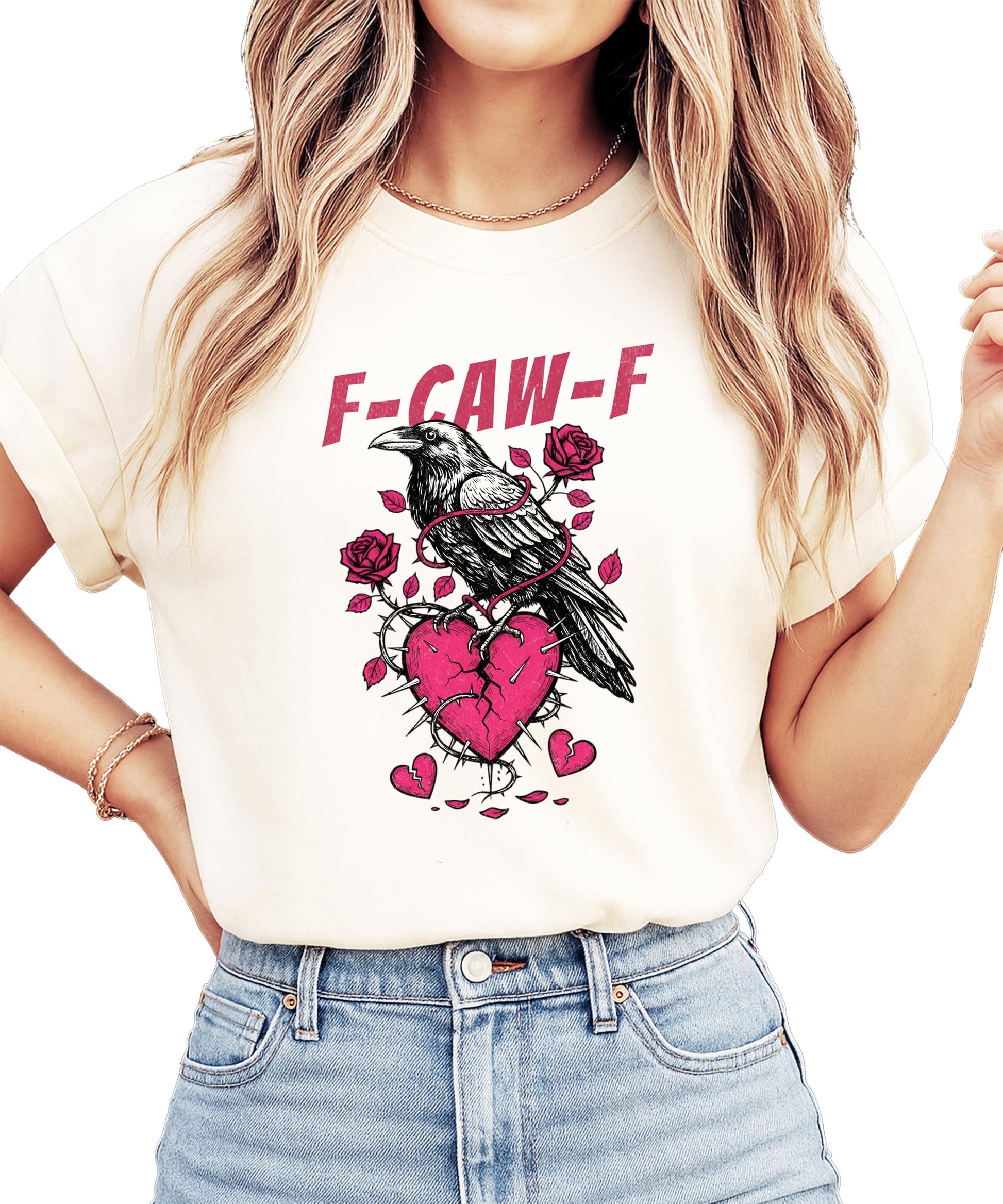 Close-up of crow and broken heart graphic print on ivory women's Valentine's Day tee