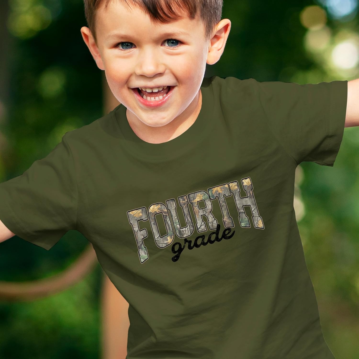 Boy or girl wearing Fourth Grade camo shirt, outdoor back to school style graphic tee