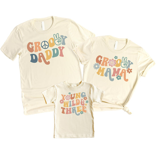 Flat lay of groovy dad birthday shirt showing print detail and natural fabric