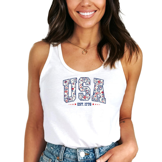 Close-up view of faux embroidery floral design on USA Est 1776 patriotic women's tank top