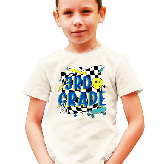 Retro 3rd grade skateboard graphic t-shirt for boys in a natural color, front view