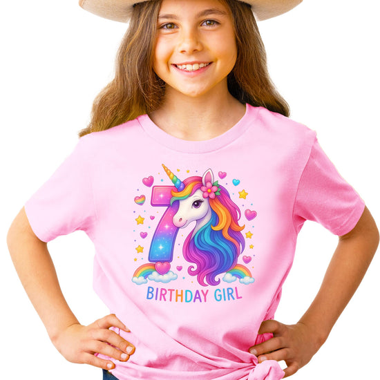 Girls 7th birthday unicorn graphic tee with sparkly rainbow number 7 design on pink shirt