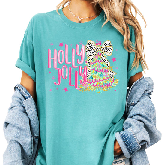 Detail shot of Holly Jolly Christmas tree graphic print on seafoam women's holiday shirt
