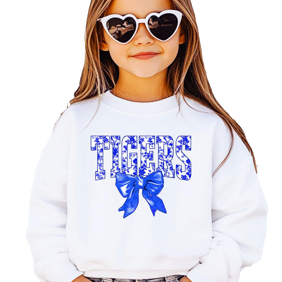 Tigers team spirit sweatshirt displaying full front graphic with blue bow accent