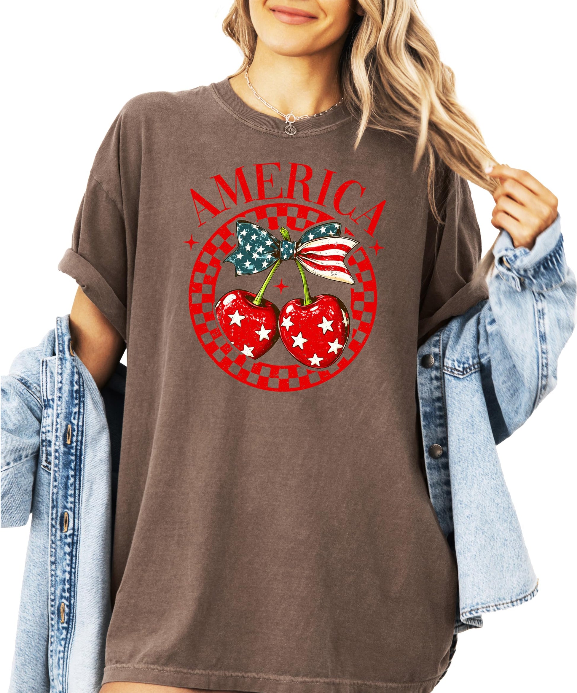 Woman wearing ivory patriotic cherry bow t-shirt with American flag elements