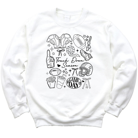 Lifestyle photo of Touch Down Season football sweatshirt styled for casual game day wear