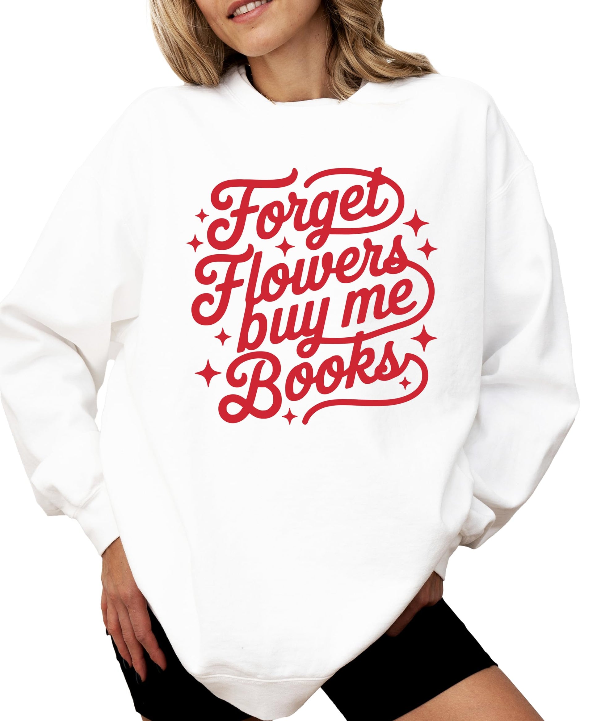 Lifestyle flat lay of Forget Flowers Buy Me Books white sweatshirt, perfect book lover Valentine's gift