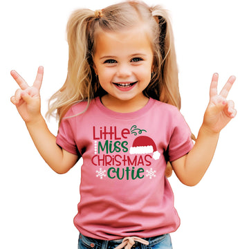 Little Miss Christmas Cutie holiday tee flat lay showing festive graphic design