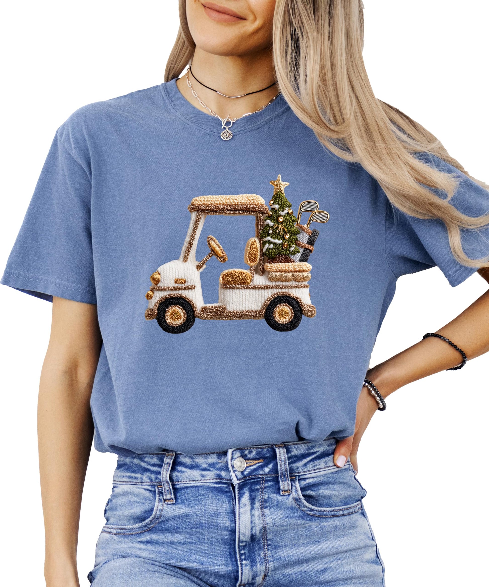 Flat lay or lifestyle shot of Olive Loves Apple Christmas golf cart graphic tee for women
