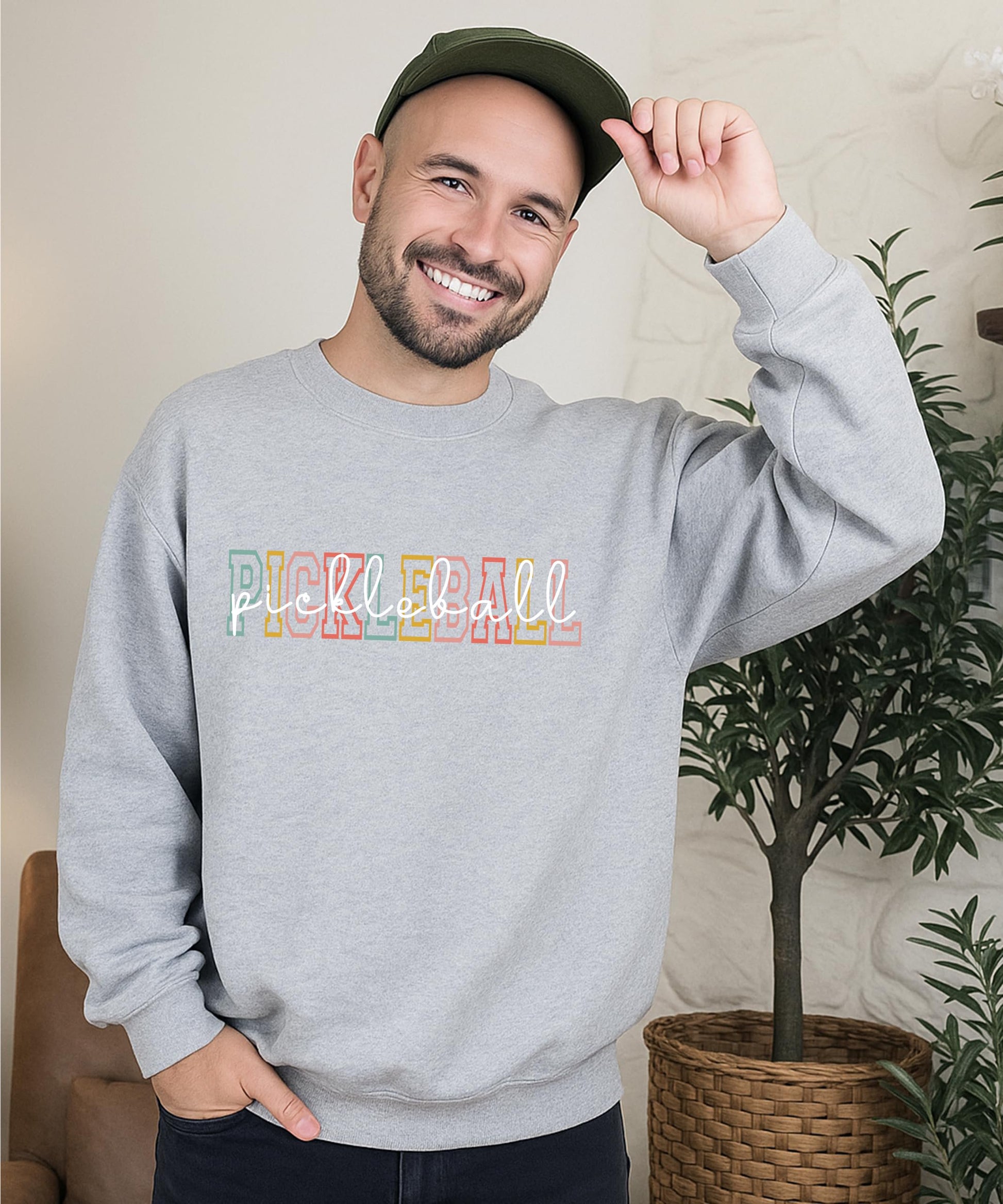 Flat lay of black unisex pickleball crewneck sweatshirt showing full design and fit