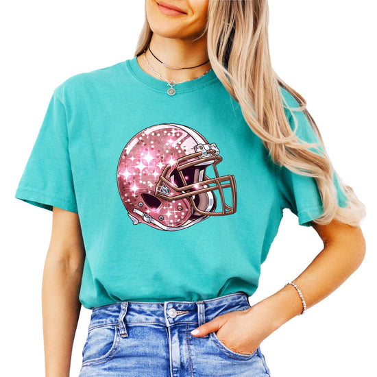Women's oversized seafoam tee with pink faux glitter football helmet graphic on the front