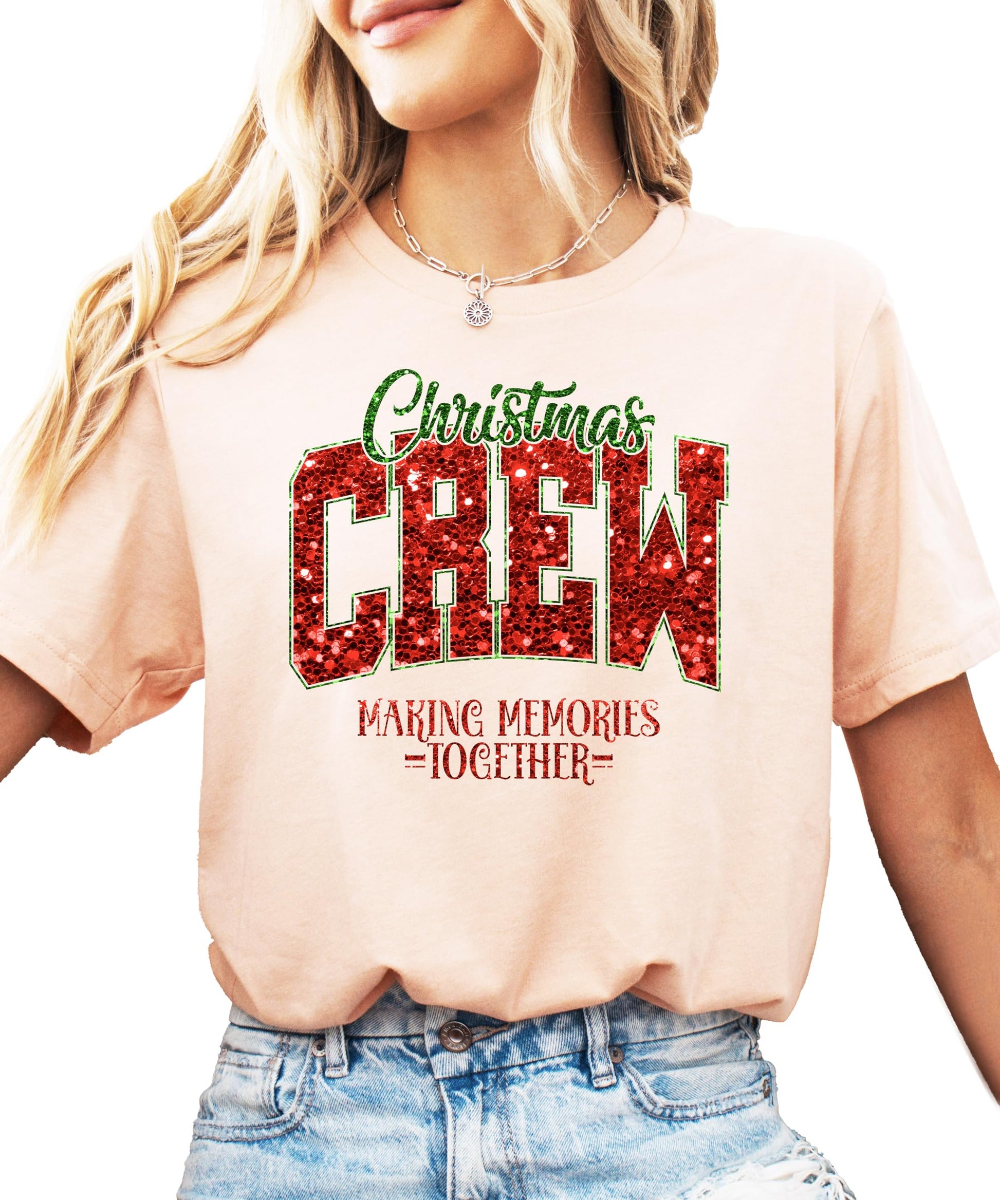Front view of Christmas Crew faux glitter holiday tee laid flat on neutral background