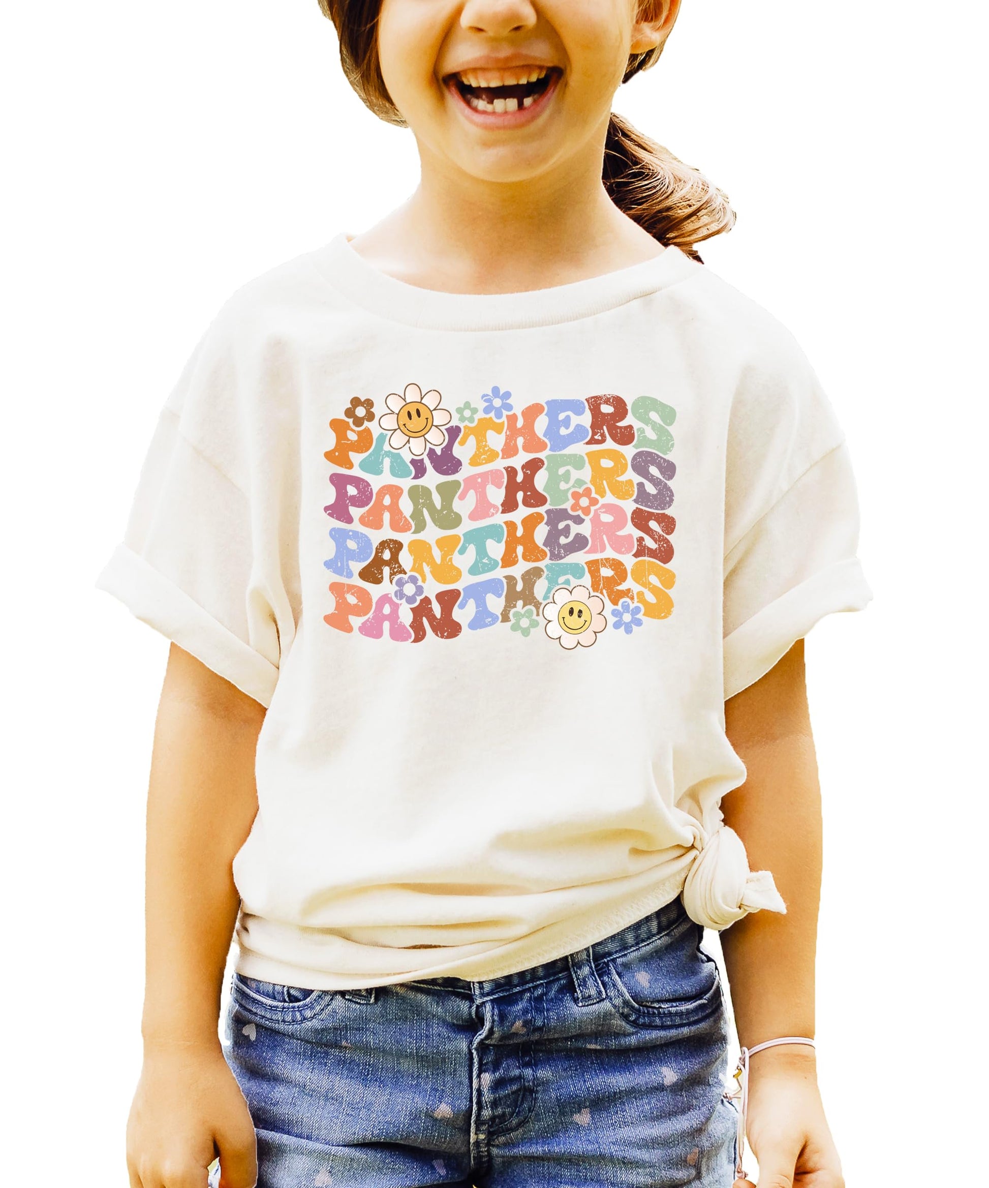 Close-up of Panthers shirt showing vintage-style wavy fonts and colorful flower graphics