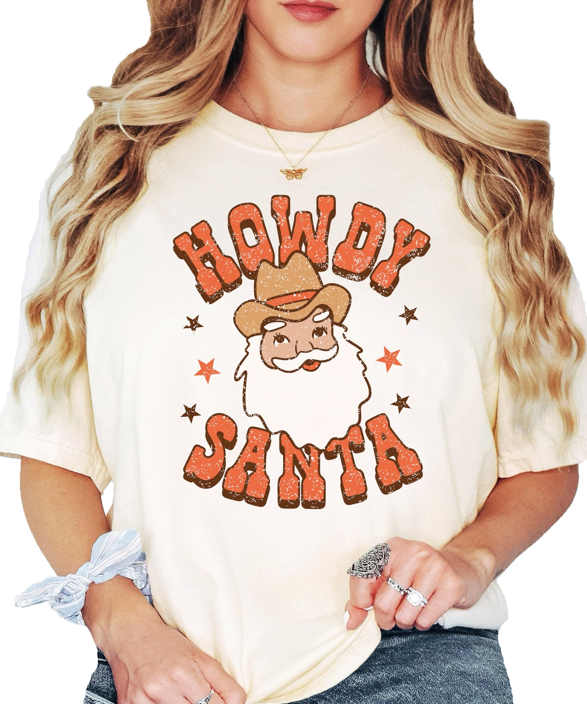 Detail shot of Howdy Santa western holiday graphic tee print quality on seafoam shirt