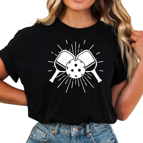 Pickleball enthusiast graphic tee showing complete paddle and ball artwork