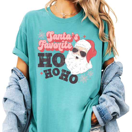 Close-up of retro Santa humorous graphic print on seafoam women's Christmas shirt