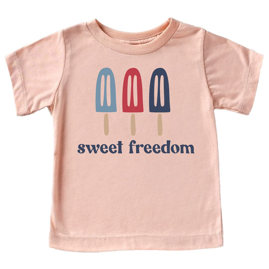 Family wearing matching Sweet Freedom Popsicle shirts in various colors for 4th of July