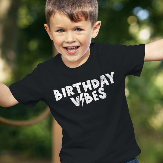 Flat lay of Birthday Vibes boys birthday graphic tee in vintage royal blue