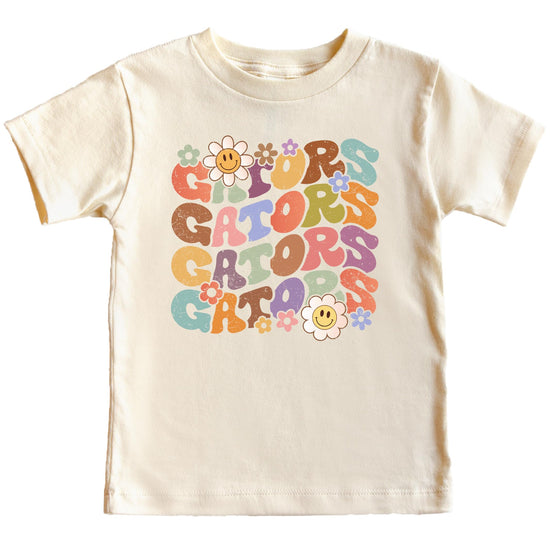 Close-up of groovy GATORS print with smiley flower details on natural tee